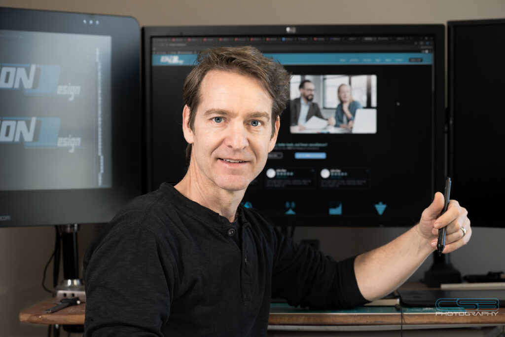 Photo of Ion Design Founder/CEO, C. Scott Baker at his design workstation.